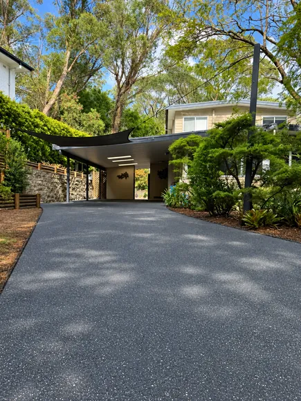 Driveway finished in Basalt spray resin with Perfect White and Night Sky fleck